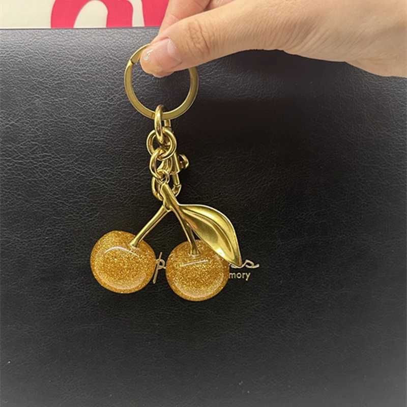 Keychains Lanyards Bag Parts Accessories Sparkling Gold Cherry Pendant For Handbag Shoulder Bags Womens Purse Keychain Charm Festive Christmas Accesso