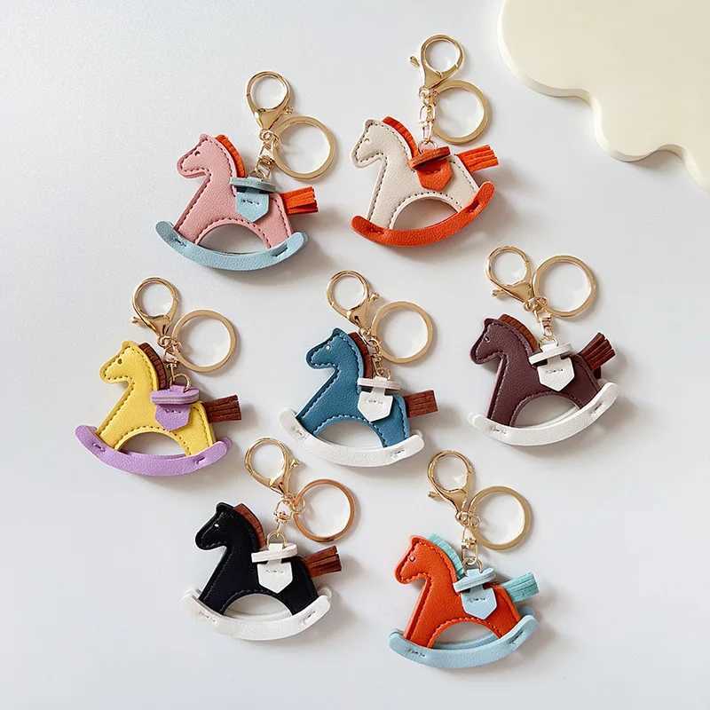 Keychains Lanyards Leather bag pendant rocking horse dragon fashion hanging decoration keychain DIY accessories H250115
