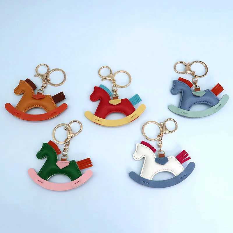 Keychains Lanyards Bag Parts Accessories Womens leather amulet bag pendant keychain cartoon pony rocking horse cute animal decoration accessories gift