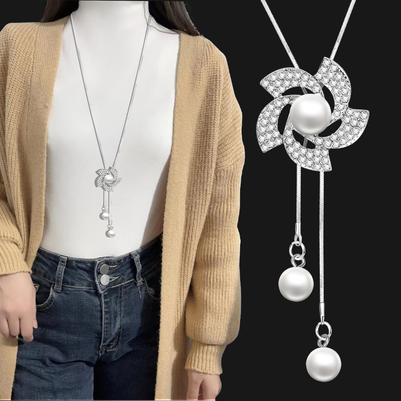 Sophisticated Statement Accessory: Versatile Charm Earrings with Shimmering Stones and Delicate Pearl Touches