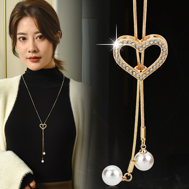 Sophisticated Statement Accessory: Versatile Charm Earrings with Shimmering Stones and Delicate Pearl Touches
