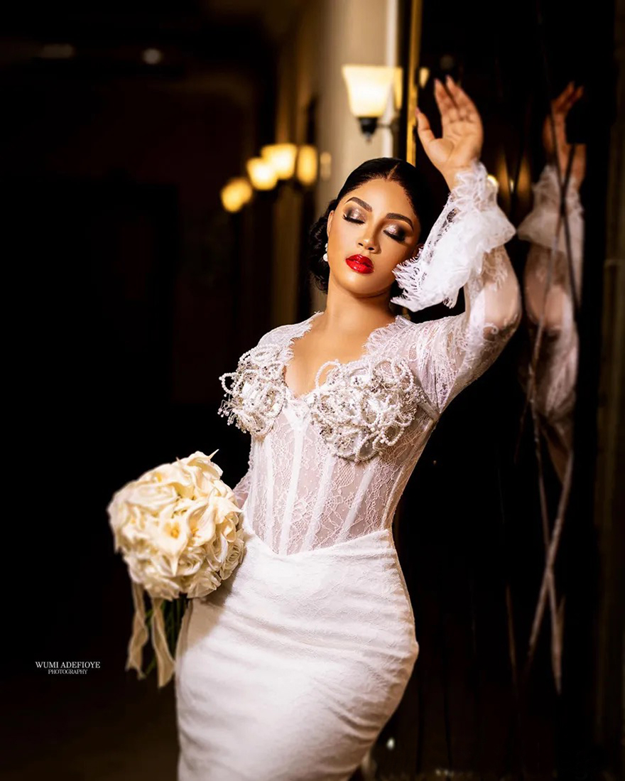 2025 Mermaid Wedding Dresses Bridal Gowns Short Wedding Gowns Illusion Long Sleeves Beaded Lace Pearls Decorated Birdal Dress for African Black Bride 