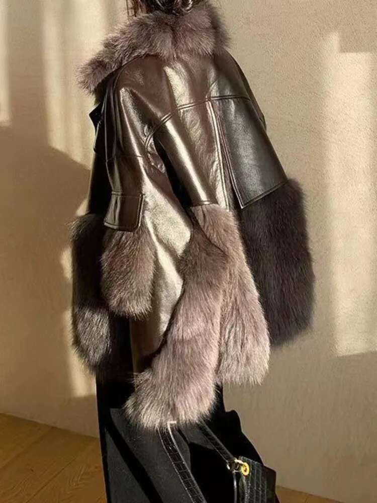 UCXQ Elegant Faux Coat Streetwear Stand Collar Double-Faced Fur Splicing PU Fashion Tide Jacket Women 2025 Autumn Winter 185