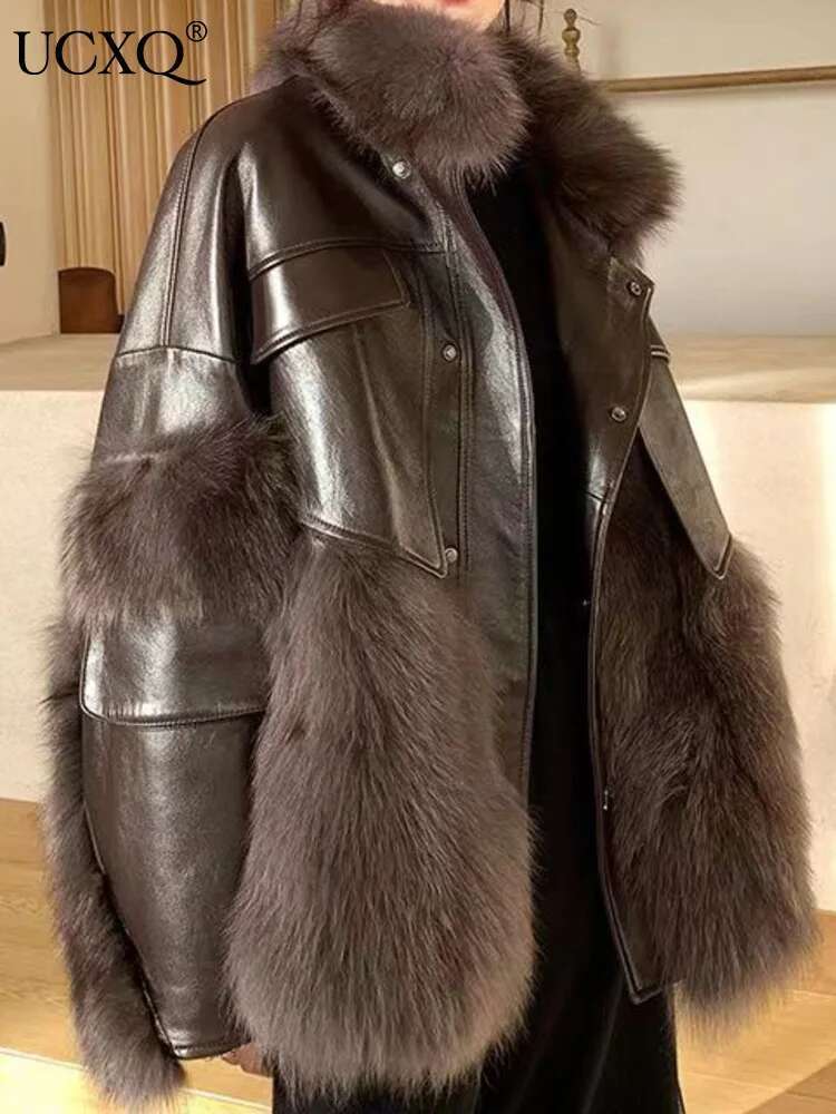 UCXQ Elegant Faux Coat Streetwear Stand Collar Double-Faced Fur Splicing PU Fashion Tide Jacket Women 2025 Autumn Winter 185