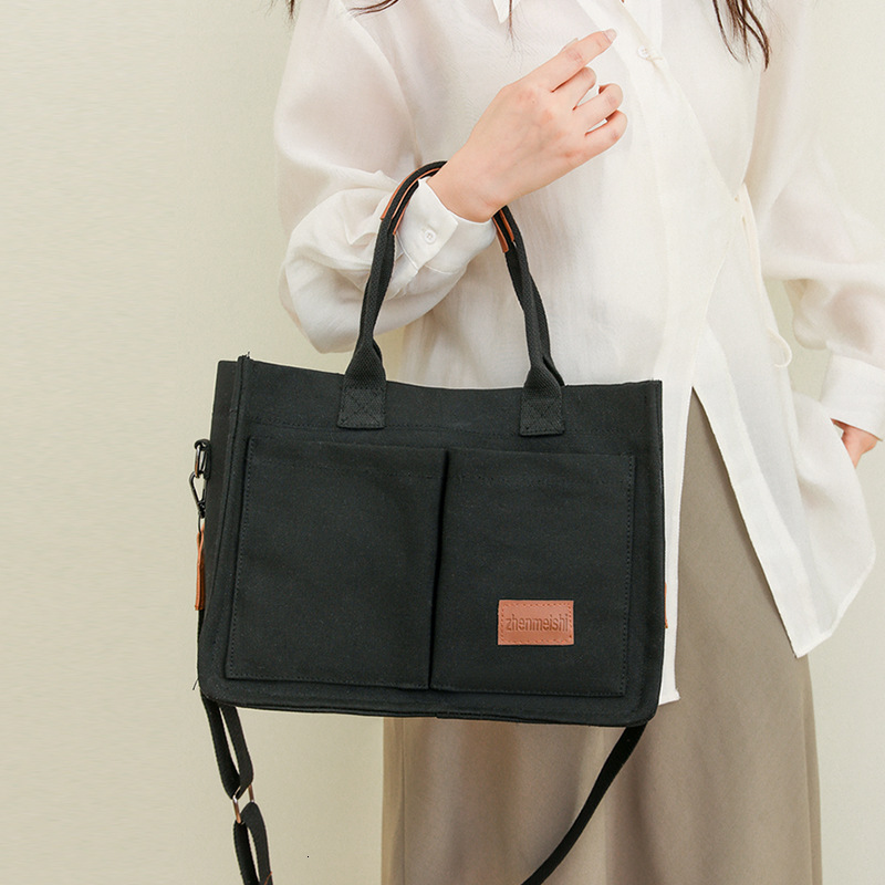 2025 New Casual Handheld Canvas Shoulder Large Capacity Multi layered Women's Crossbody Bag swissmilitary