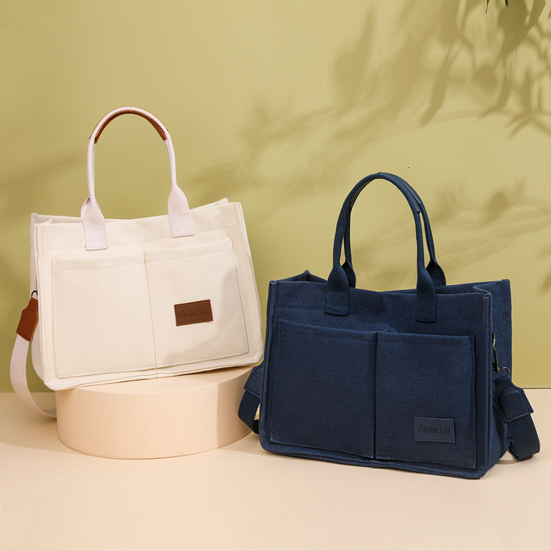 2025 New Casual Handheld Canvas Shoulder Large Capacity Multi layered Women's Crossbody Bag swissmilitary