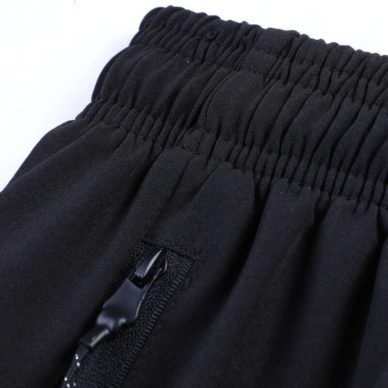 Ddmyoutdoor China Domestic Fiess Workout Sports Men Breathable Running Training Zipper Pockets Short Man Loose Beach Shorts