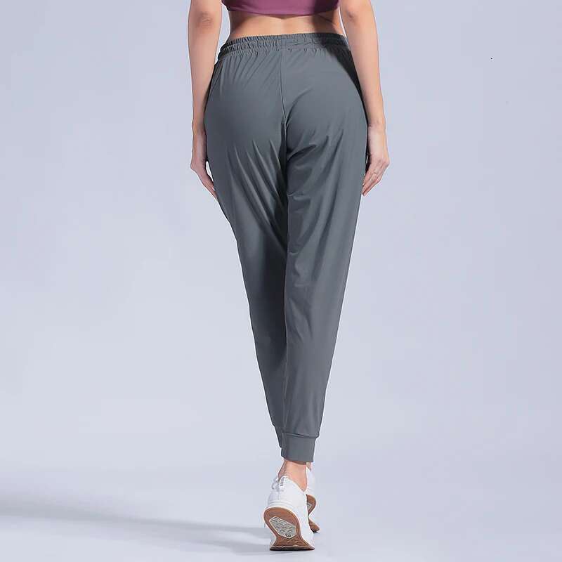 Ddmyoutdoor China Domestic Female Sportswear Trousers Nylon Quick Dry Running Pants Causal Breathable Drawstring Pocket Yoga Joggers Women Sweatpants