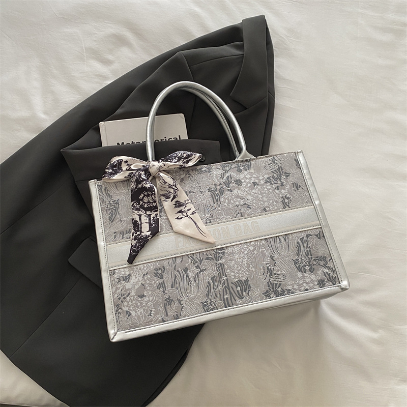 2025 new free shipping designer shoulder bag Vintage Ribbons casual versatile Tote package for woman fashionable