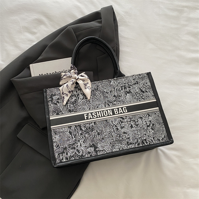 2025 new free shipping designer shoulder bag Vintage Ribbons casual versatile Tote package for woman fashionable