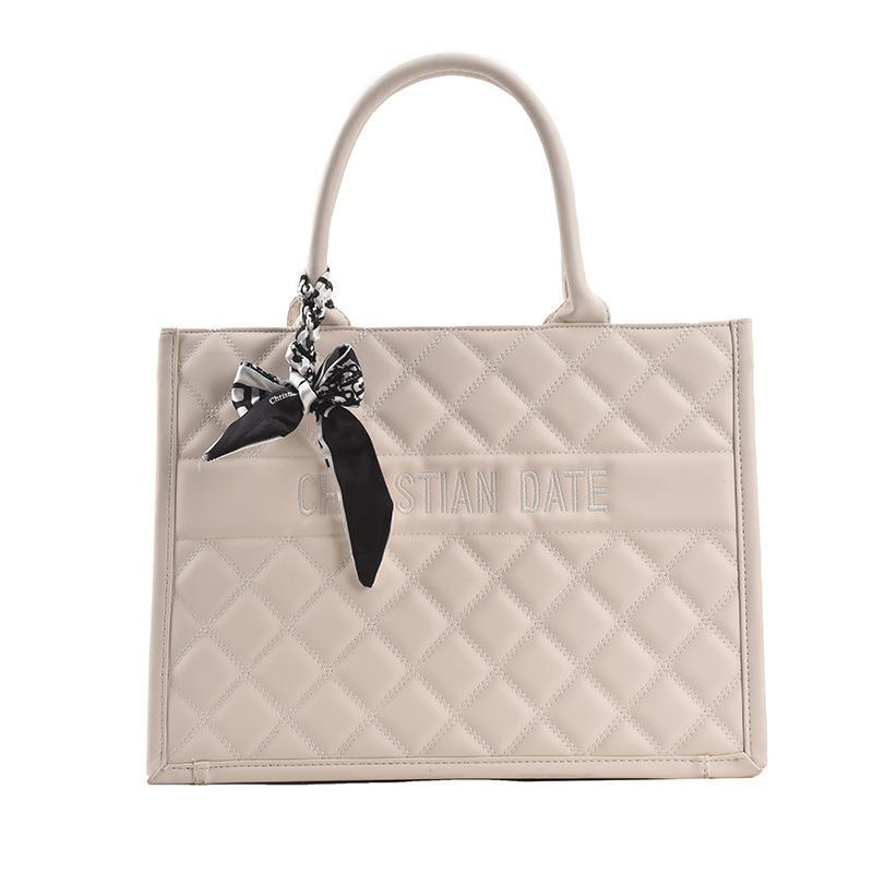 2025 new free shipping designer shoulder bag Vintage Plain casual versatile Tote package for woman white