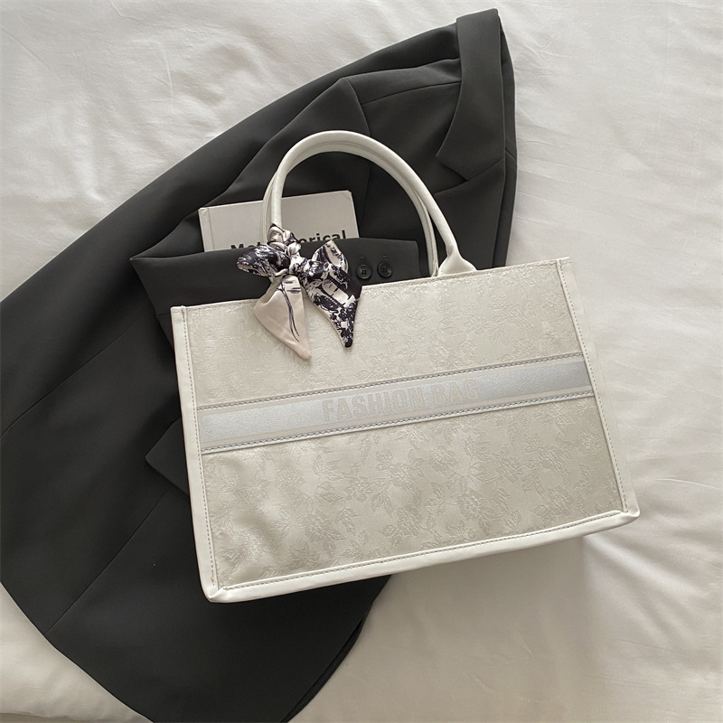 2025 new free shipping designer shoulder bag Vintage Ribbons casual versatile Tote package for woman fashionable