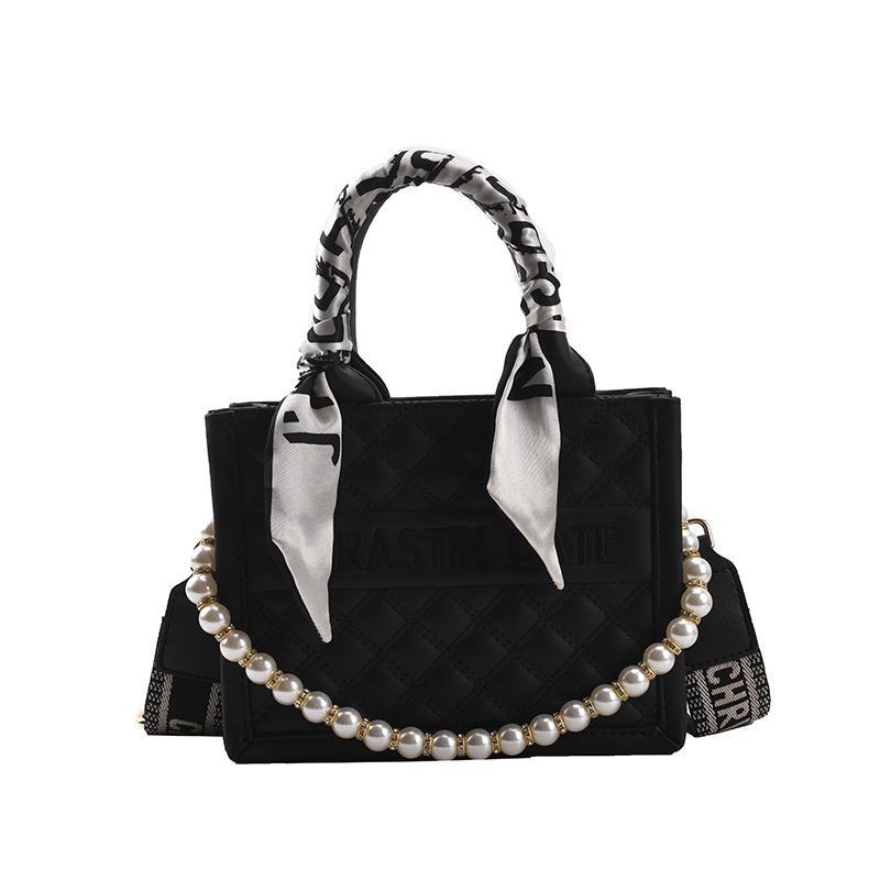 2025 new free shipping designer shoulder bag Vintage Plain casual versatile Tote package for woman white black