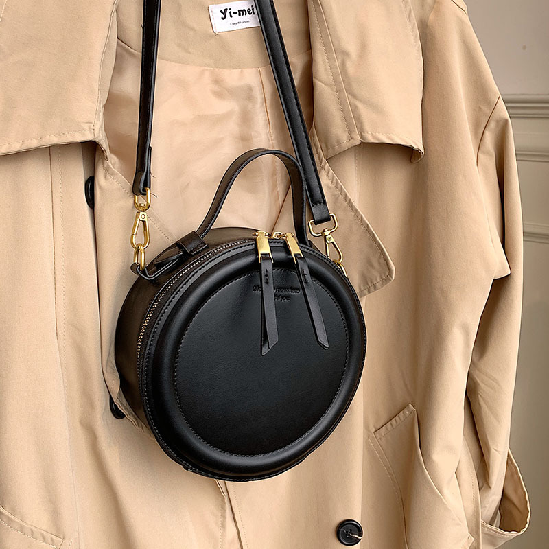 Europe and the United States new retro simple hand bill of lading shoulder small round bag crossbody bag for ladies ins trend bag wholesale