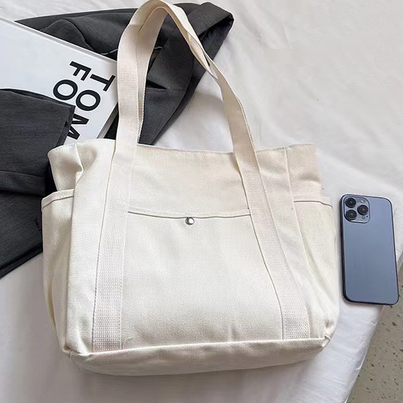 Simple commuter omnibus large capacity Tote canvas bag high appearance level art college students class shoulder cloth bag 2025