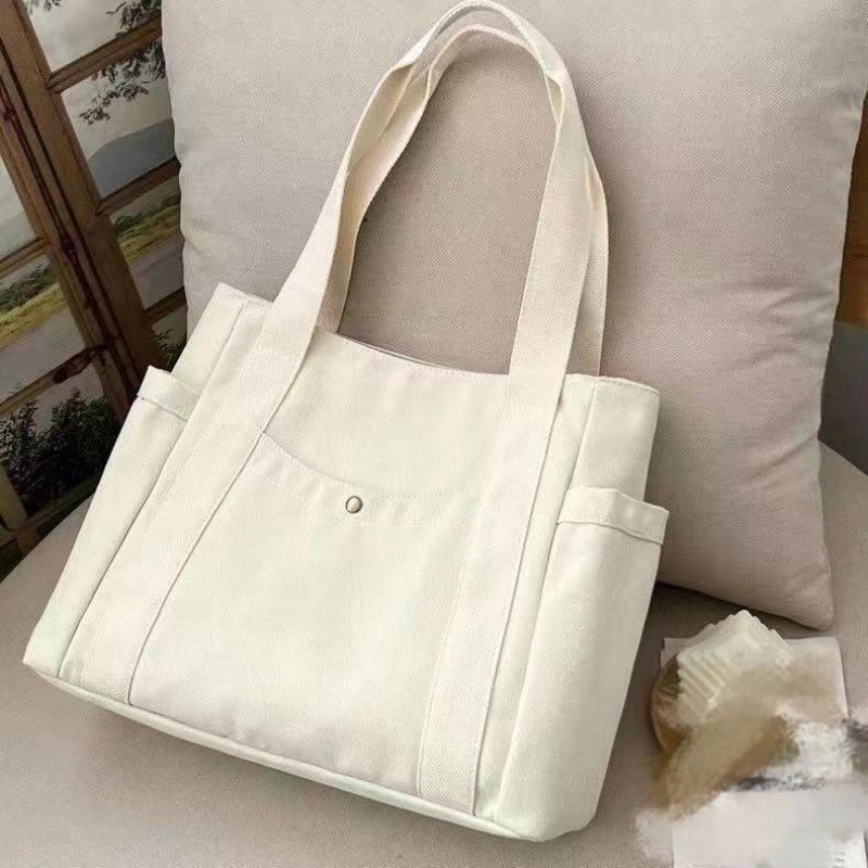Simple commuter omnibus large capacity Tote canvas bag high appearance level art college students class shoulder cloth bag 2025