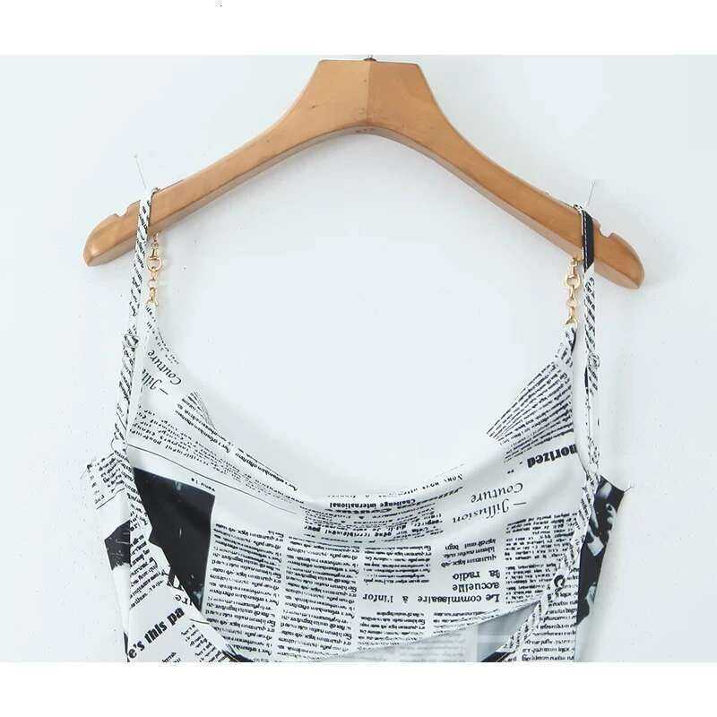 YENKYE New Women Newspaper Letter Print Irregular Hem Sg Dresses Fashion Backless Thin Straps With Chain Summer Sexy Dress