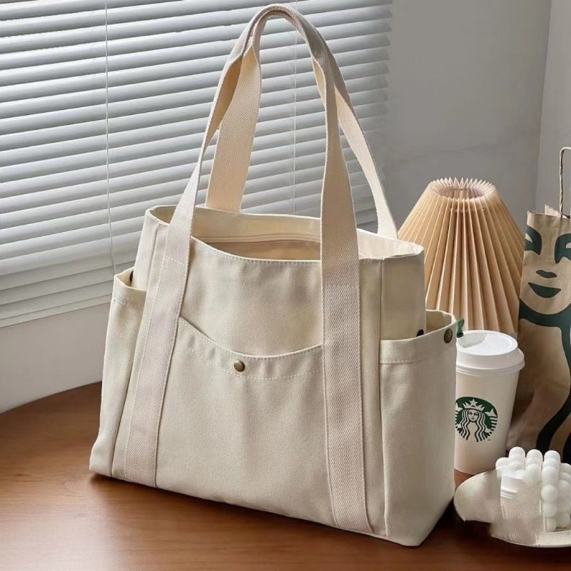 Simple commuter omnibus large capacity Tote canvas bag high appearance level art college students class shoulder cloth bag 2025