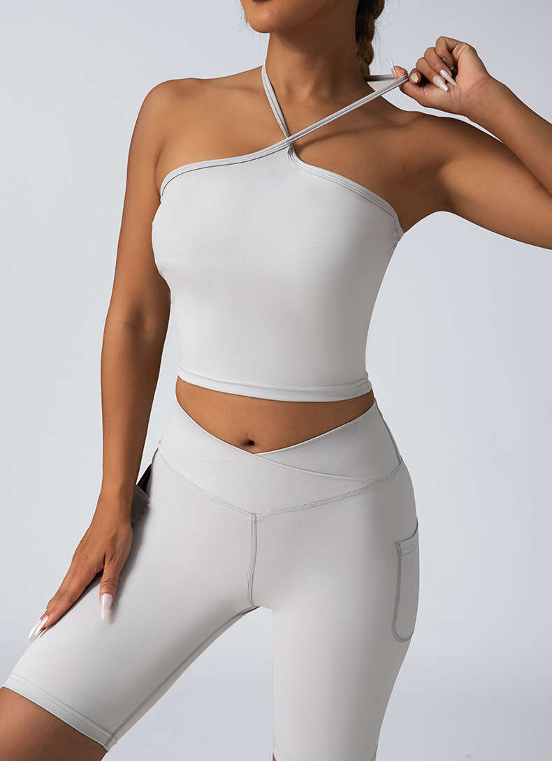 High quality women's casual versatile camisole seamless yoga set bra cross waist peach hip shorts trendy fitness sportswear
