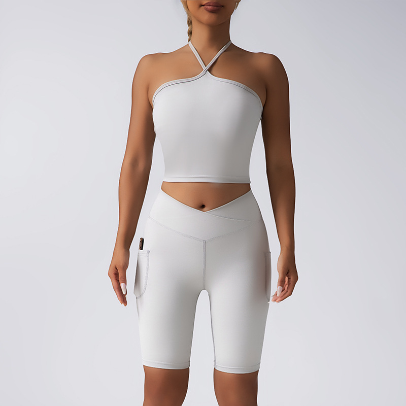 High quality women's casual versatile camisole seamless yoga set bra cross waist peach hip shorts trendy fitness sportswear