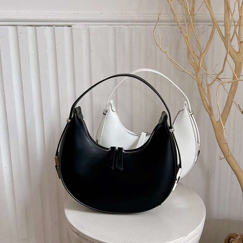 Small niche design handbag 2025, Korean new crescent spicy girl armpit bag, metal buckle small round bag for women