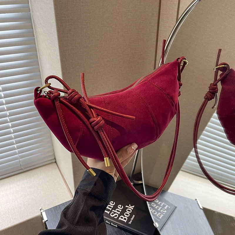 Korean suede shoulder bag solid color simple and fashionable cross shaped bag soft Western zipper handbag 250109