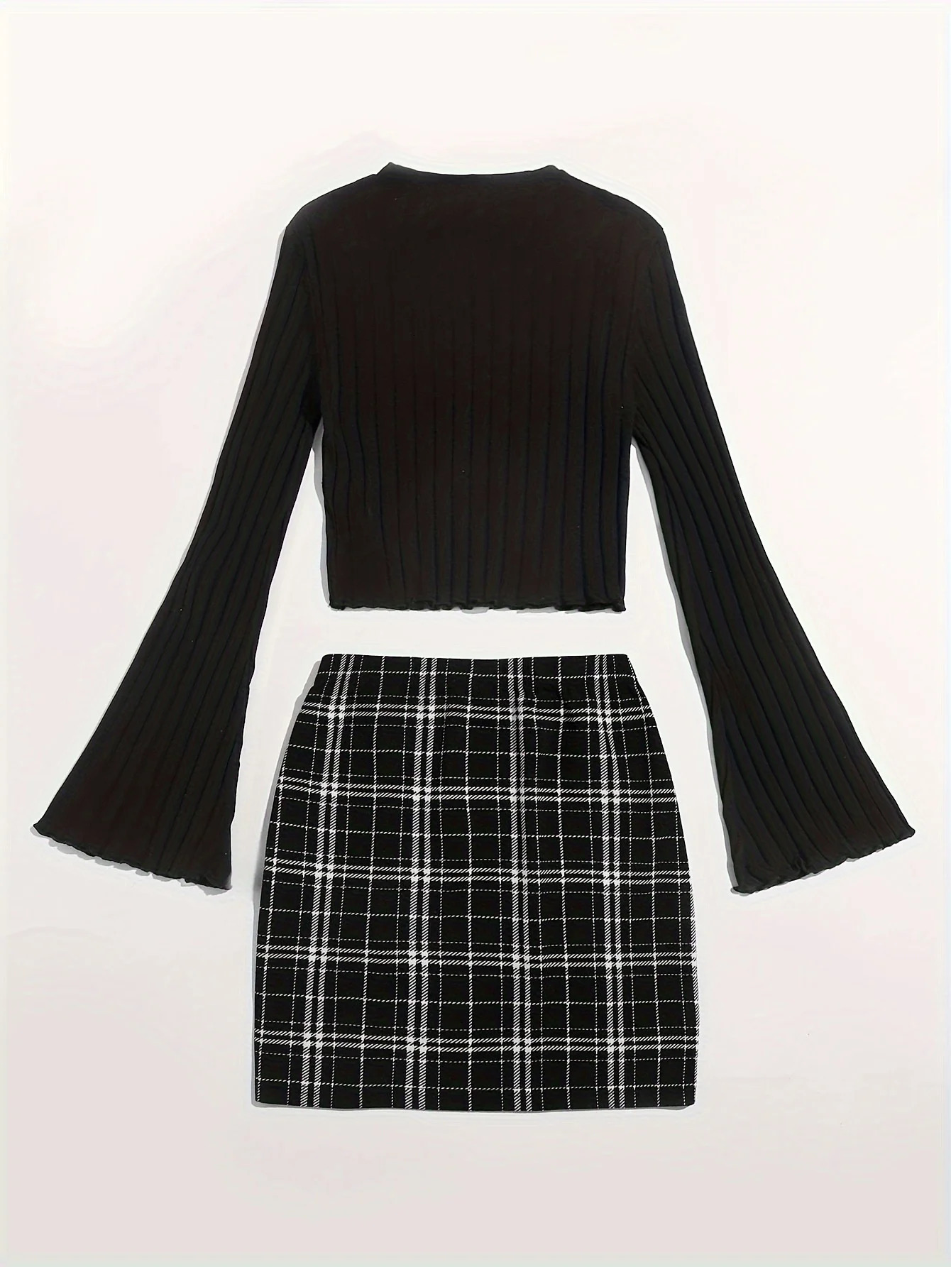 Grasping hair casual and fashionable long sleeved round neck tshirt buttocks slim fit half skirt set womens clothing 250122