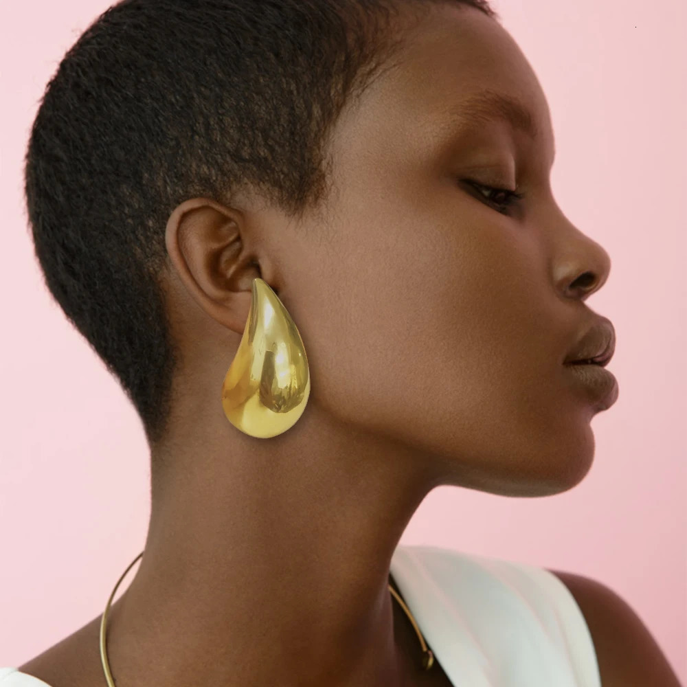 Golden largesized water droplet hollow earrings for womens fashion 250118