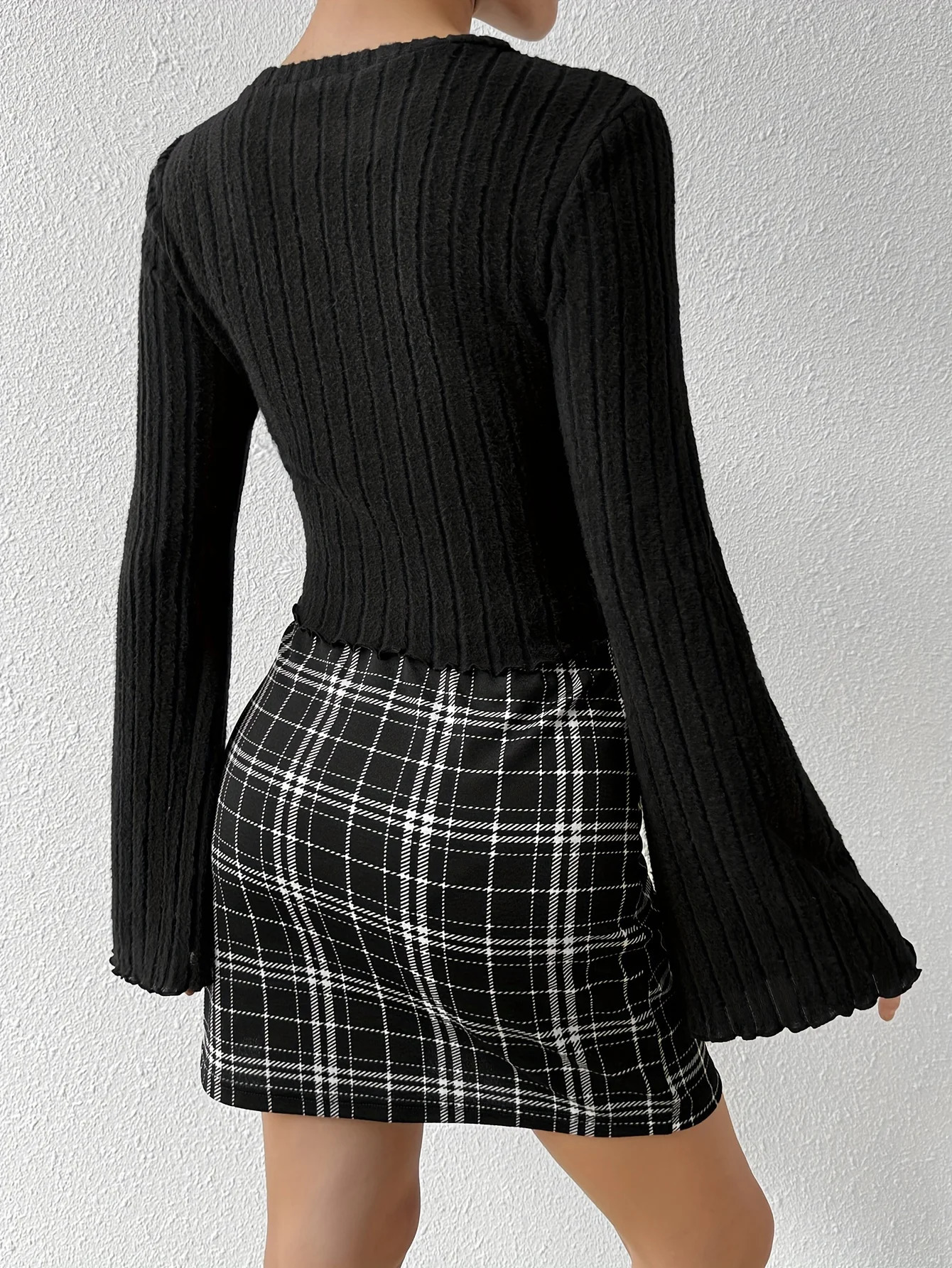 Grasping hair casual and fashionable long sleeved round neck tshirt buttocks slim fit half skirt set womens clothing 250122