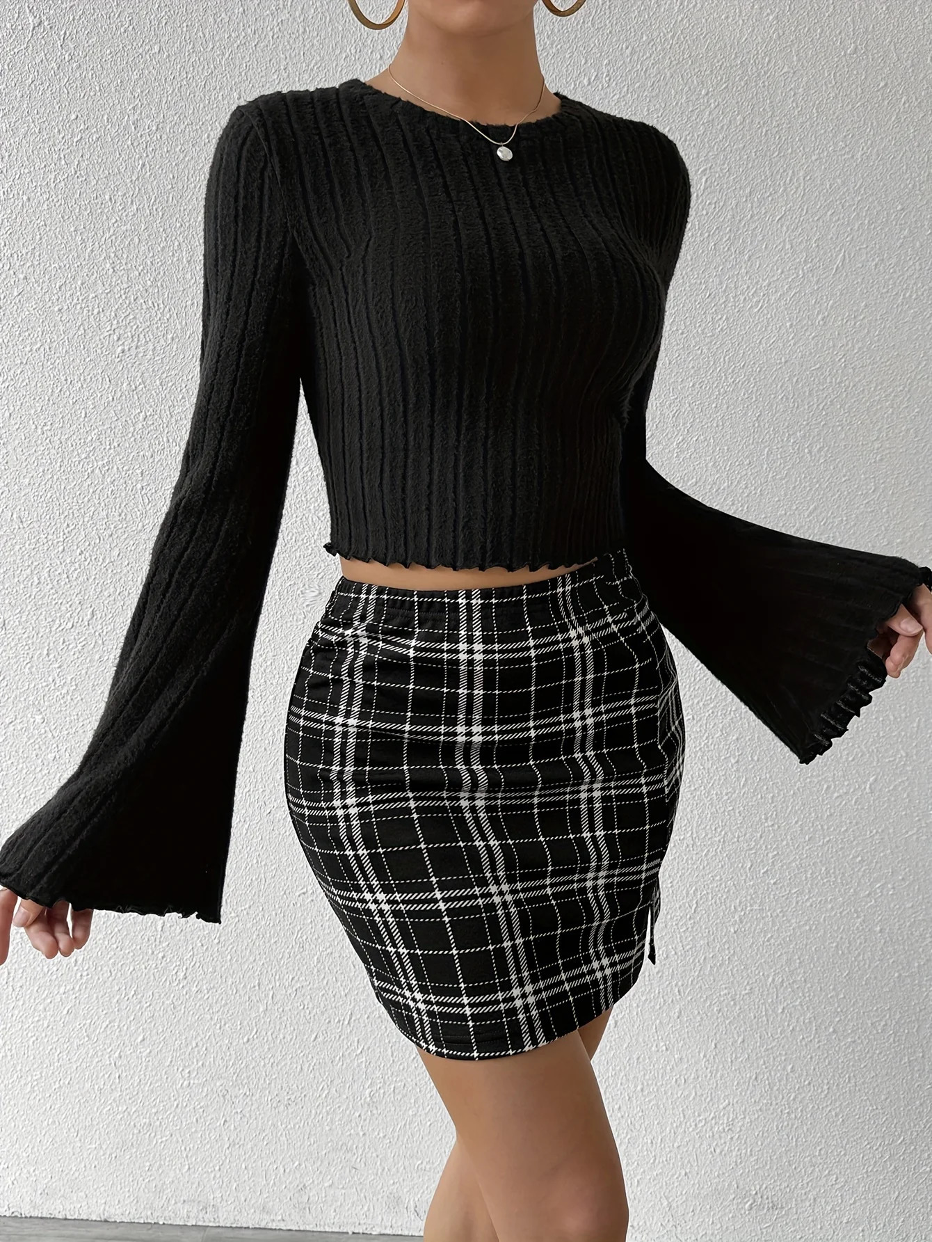 Grasping hair casual and fashionable long sleeved round neck tshirt buttocks slim fit half skirt set womens clothing 250122