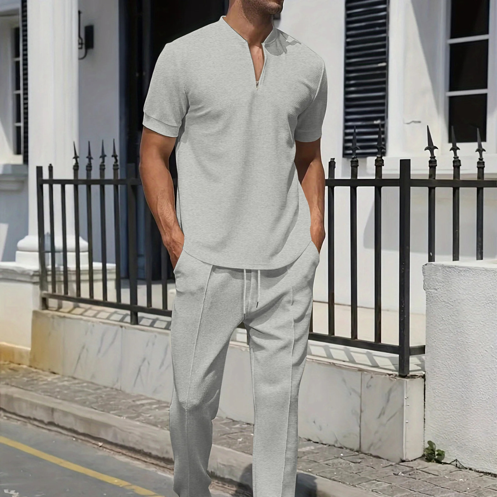 Mens Summer Suit Waffle Fabric ShortSleeved Top Jacquard Polo Shirt Drawstring Trousers 2Piece Set Mens leisure suit 250724