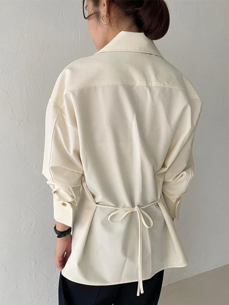 EAM Women Beige Zipper Pocket Back Bandage Blouse Lapel Long Sleeve Loose Fit Shirt Fashion Spring Autumn 1DF1491 250731