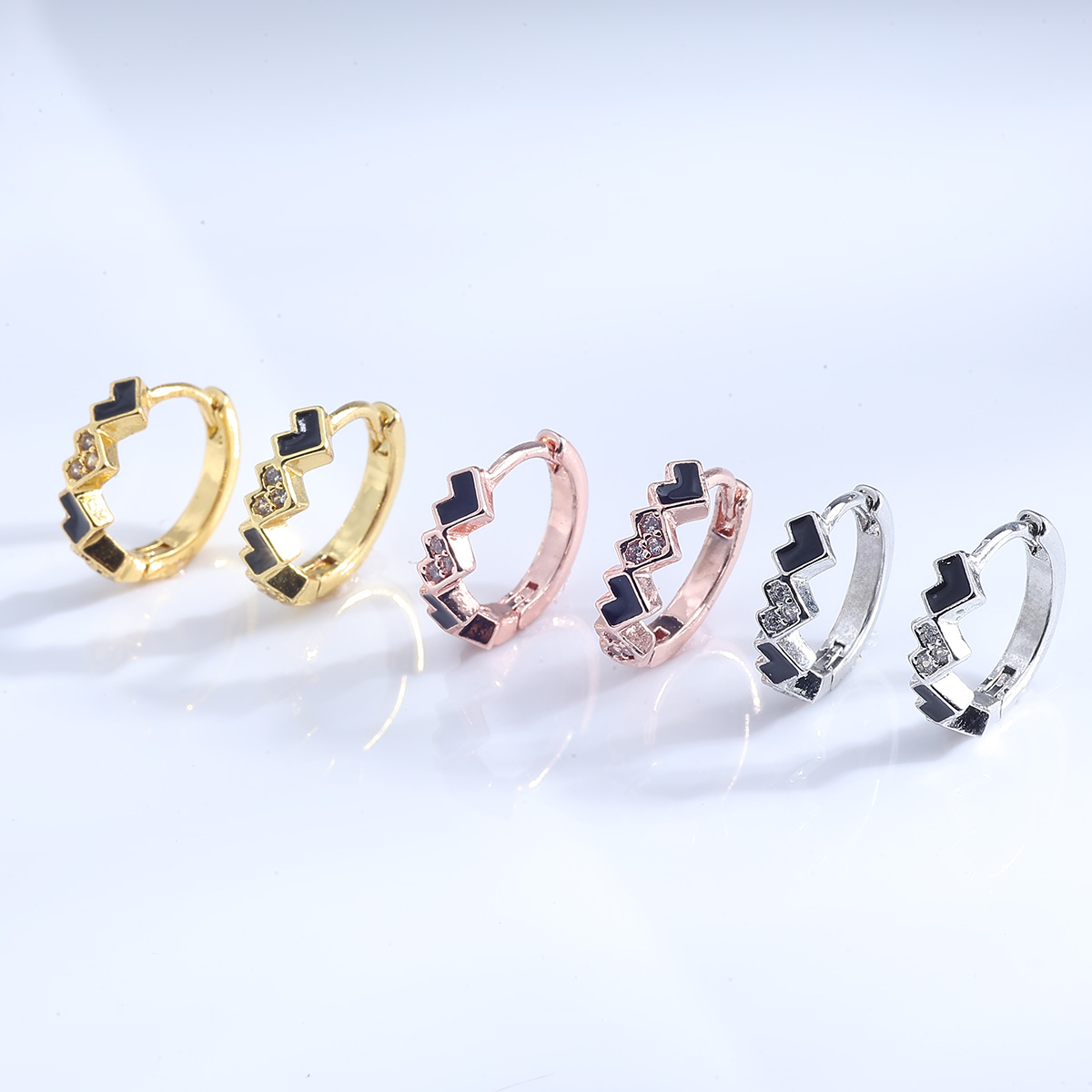 Cross border new copper inlaid zircon four leaf clover irregular earrings Fried Dough Twists earrings pierced jewelry