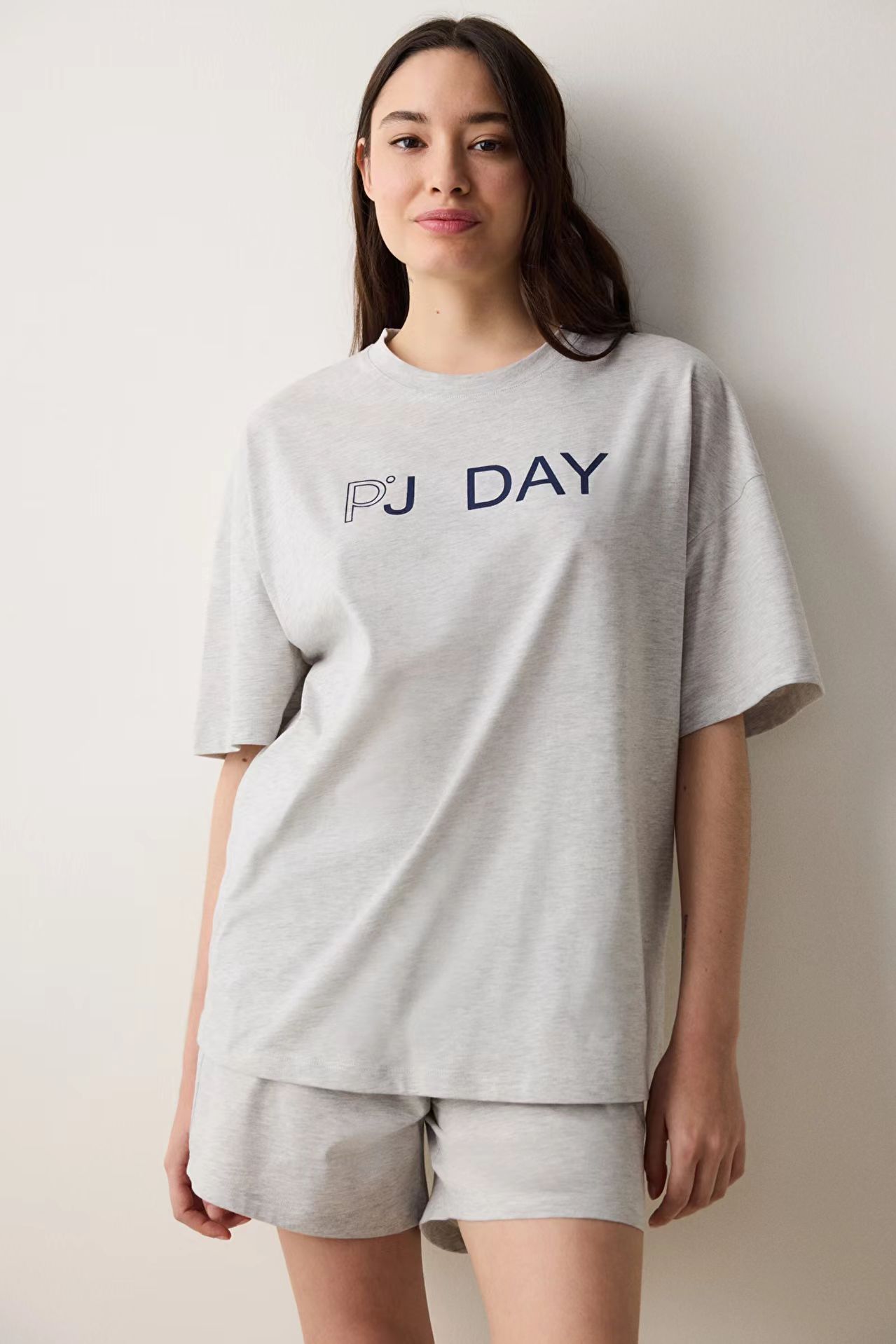 Women's Summer Sleepwear with Sporty Outfit Features - Comfortable Short Sleeves and Shorts Set