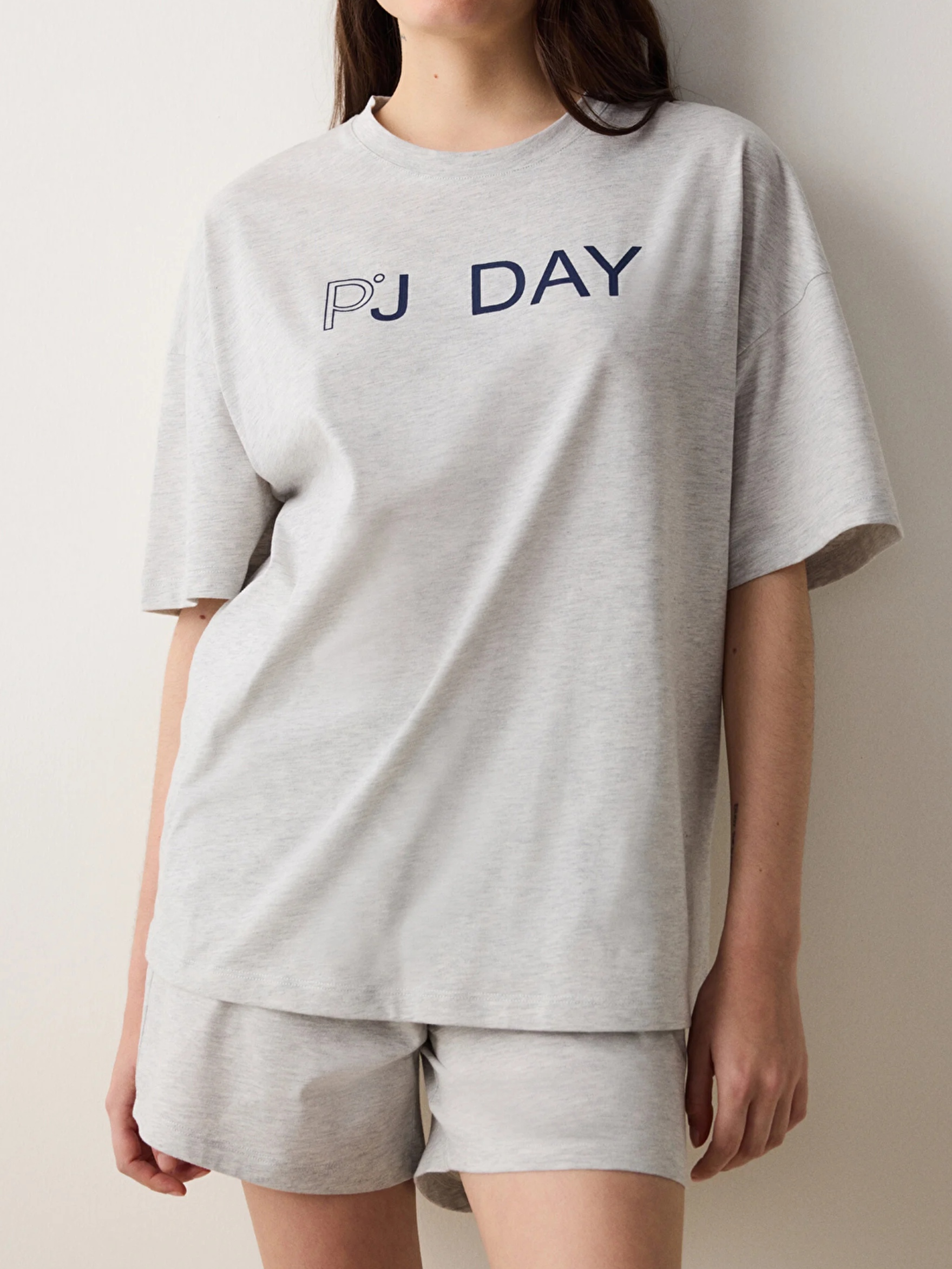 Women's Summer Sleepwear with Sporty Outfit Features - Comfortable Short Sleeves and Shorts Set