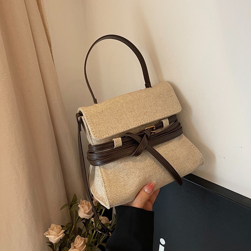 Summer New Women s Handbag New Light Luxury Niche Design Women s Crossbody Bag Fashionable Commuting Canvas Women s Shoulder Bag New Designer Bag