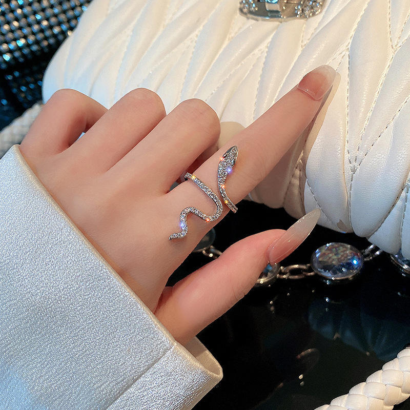 The 2025 New Zirconia Snake Twist Women's Ring Is A Unique And Fashionable Designer Jewelry Wedding Ring And Index Finger Ring With A Niche Desig