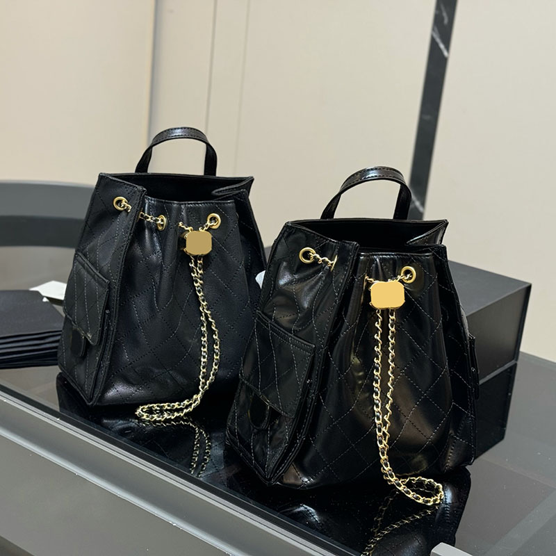 25s Ladies Designer Backpack Bag with Top Handle Hobos Calfskin Oil Wax Leather Golden Buckle Hardware String Design Flap Pockets Shoulder Chain Tote 24x22cm