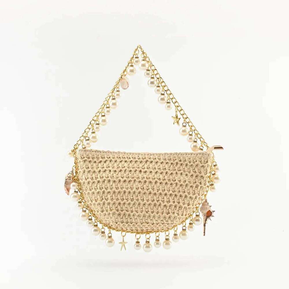 The Handcrafted French-Style Holiday Straw Bag with a Seashell Design, to Be Worn over Shoulder under the Arm
