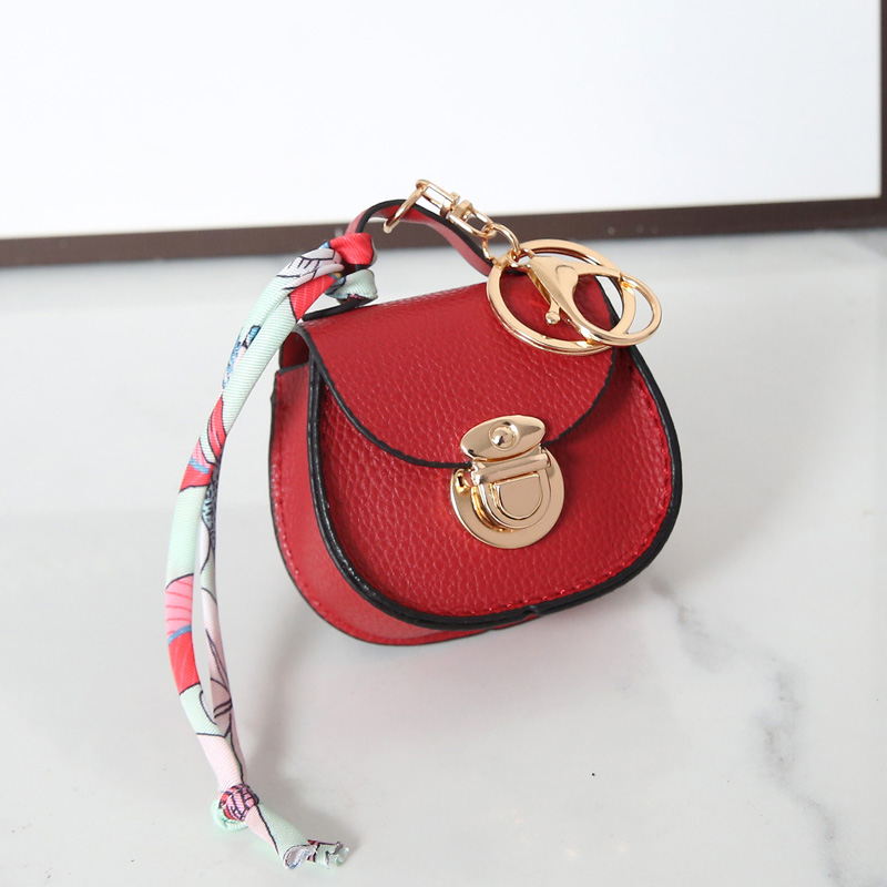 Luxury Designer Mini Saddle Headphone Bag Universal Headset Can hold other small items compact with keychain Storage Bags Portable