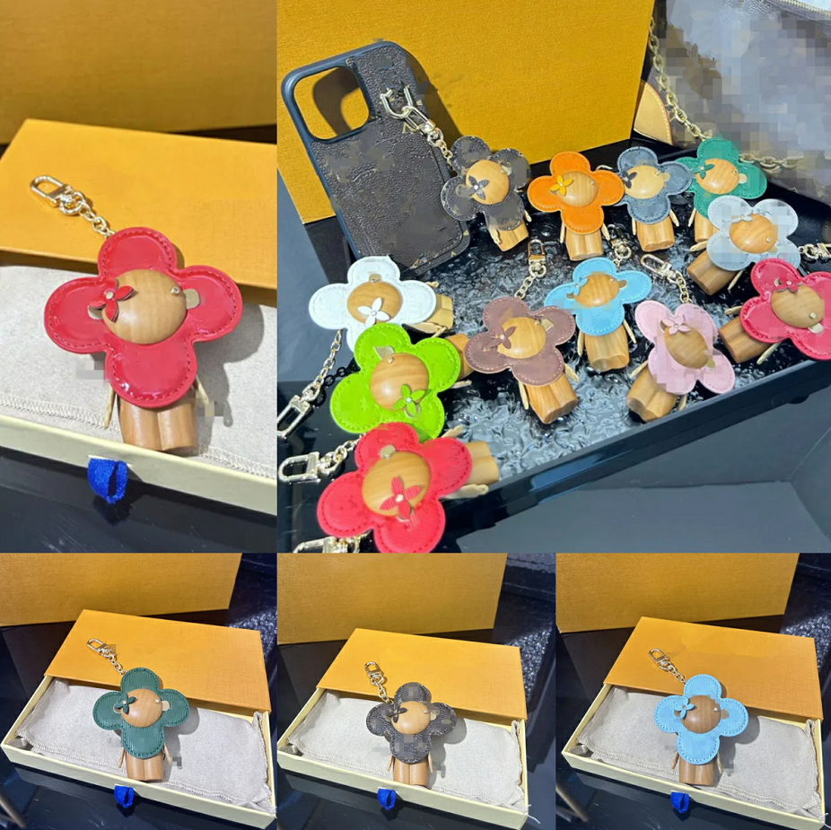 Sunflower Charms Designer Keychains Car Charm Fun Keychain Toys Couple Charm Top Quality Cute V Letter Doll Key Rings Luxury Bag Charm Keychains 12 Colors