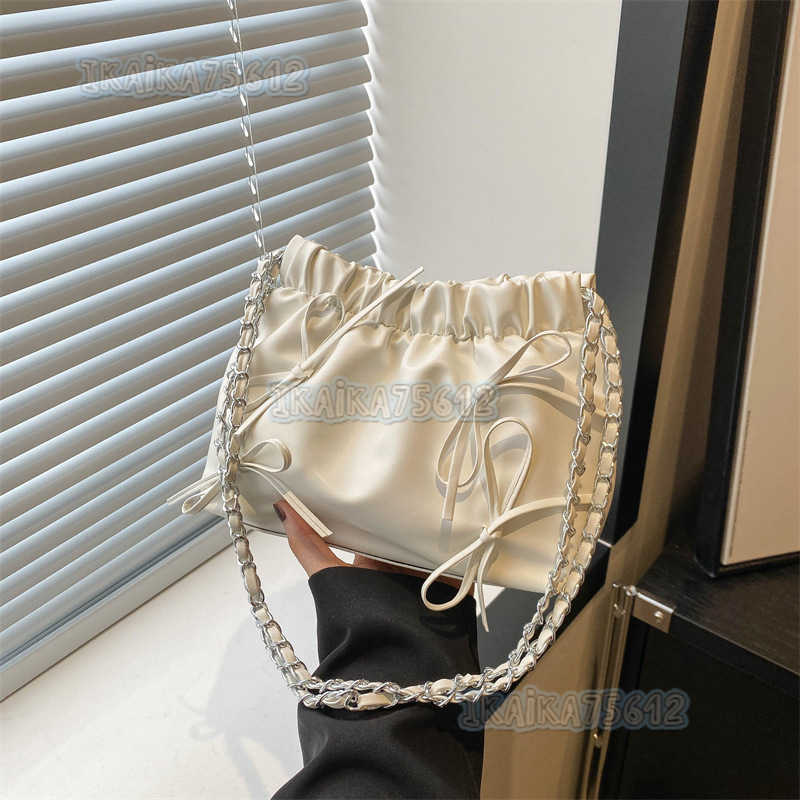 Solid Color Womens Bag 2025 Summer New Versatile Simple Trendy Textured Bowknot Bucket Chain Trendy Shoulder Bag H250804
