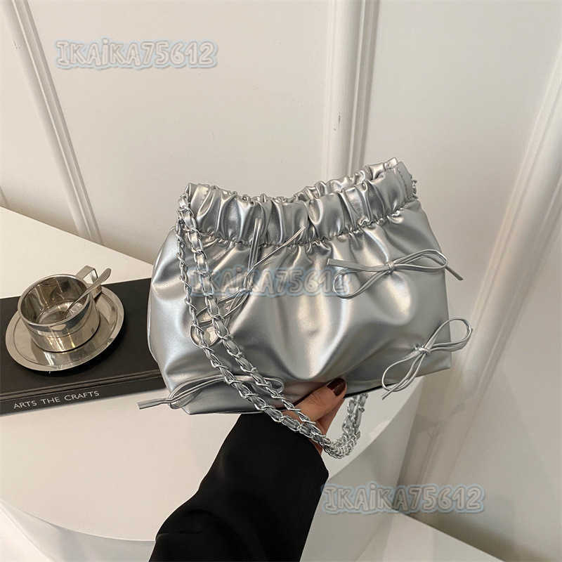 Solid Color Womens Bag 2025 Summer New Versatile Simple Trendy Textured Bowknot Bucket Chain Trendy Shoulder Bag H250804