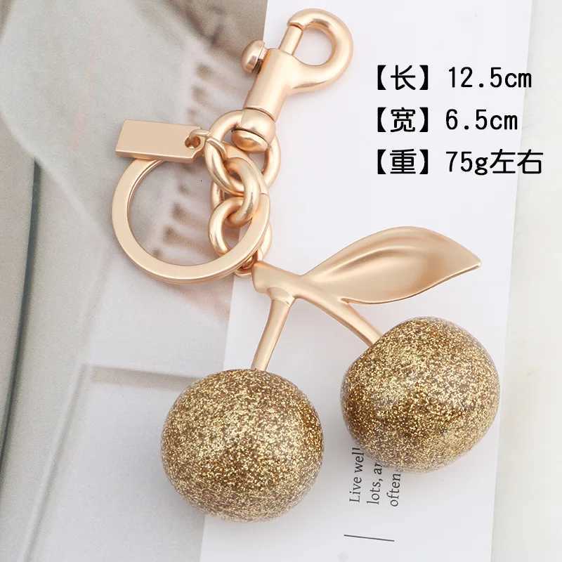 Purple Cherry Charm Pendant Decoration Womens High-Grade Keychain For Fashionable Handbag Shoulder Bag Christmas Gift G250802