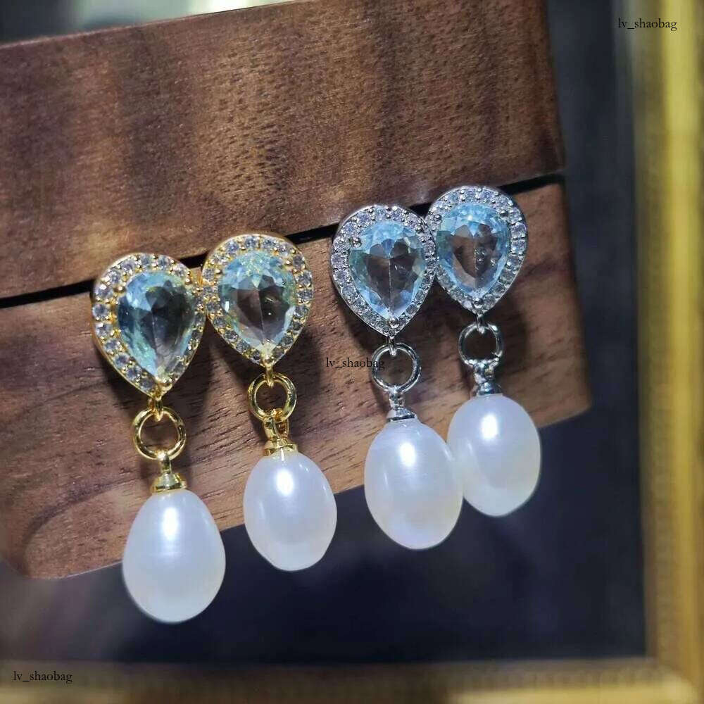 DHcollections Dan Tao S Sier Needle French Style Glazed Freshwater Rice-shaped Pearl Long Tassel Earrings for Women