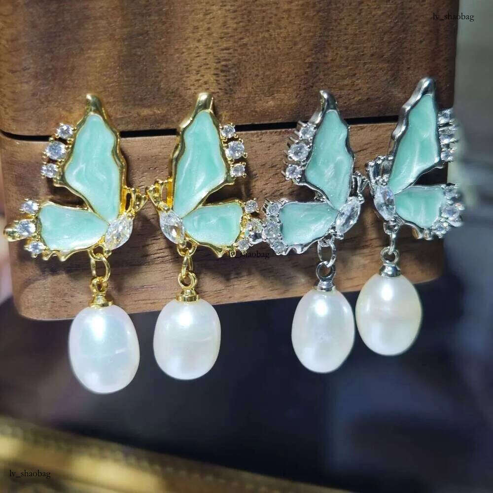 DHcollections Dan Tao S Sier Needle French Style Glazed Freshwater Rice-shaped Pearl Long Tassel Earrings for Women
