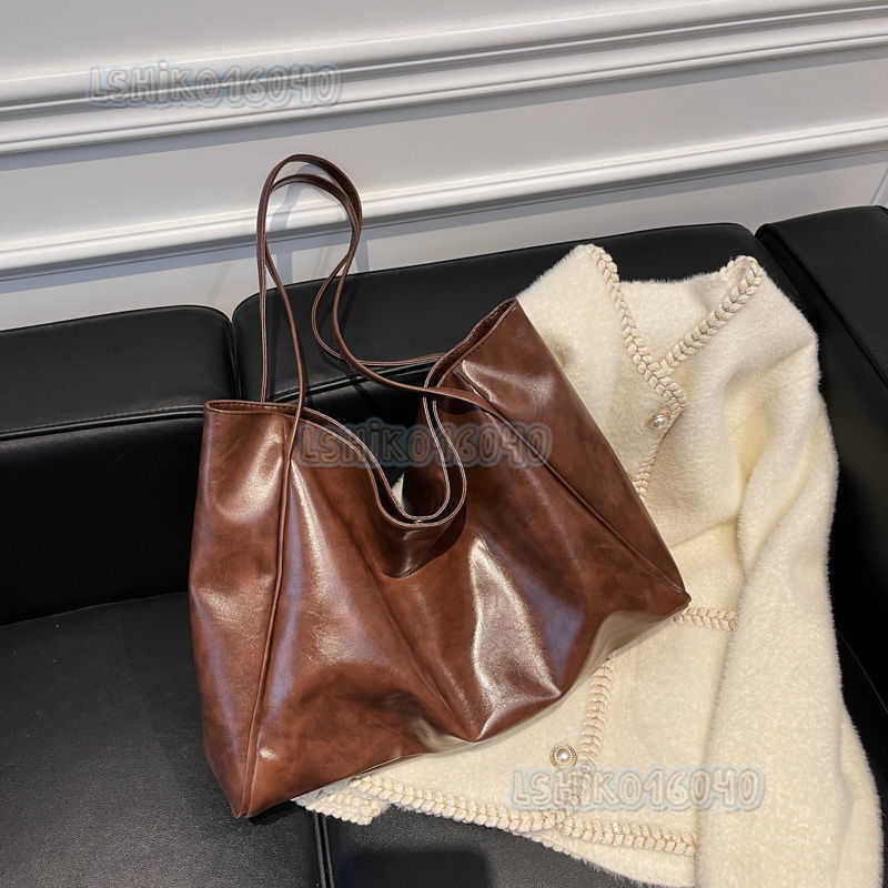 2025 New Self-made Bag Womens New Portable Bag Niche Design Versatile One Shoulder Leisure Armpit Bag H250804