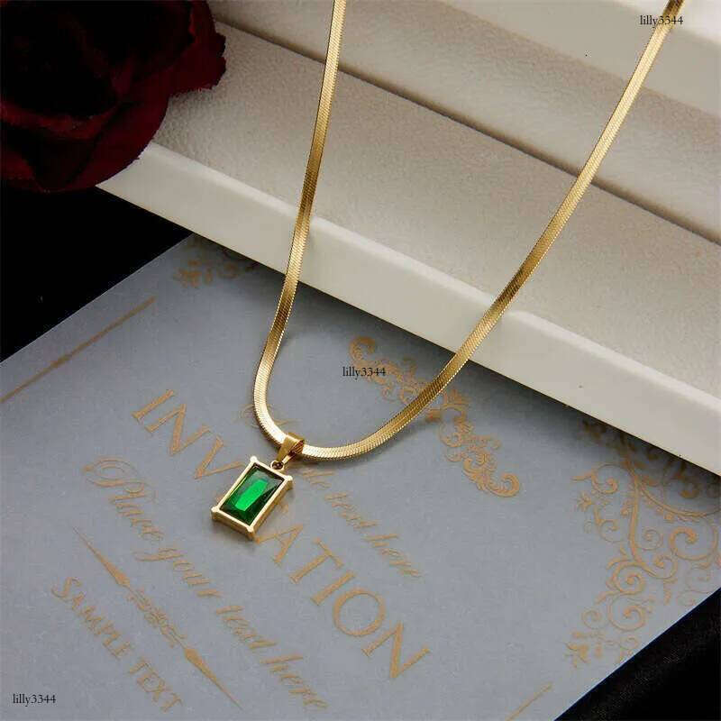 DHcollections Japanese and Korean Style Niche Design Blade Chain High-end Emerald Zircon Pendant Titanium Steel Necklace for Women