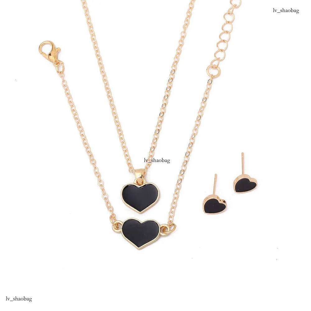 DHCollections 2025 Spring Heart Jewelry - Minimalist Necklace Bracelet Earrings Set for Women (2 Color Options)