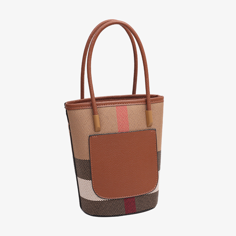 new stylish women's bags with a fashionable and high - quality feel Made of genuine leather and canvas featuring a checkered pattern Includes tot